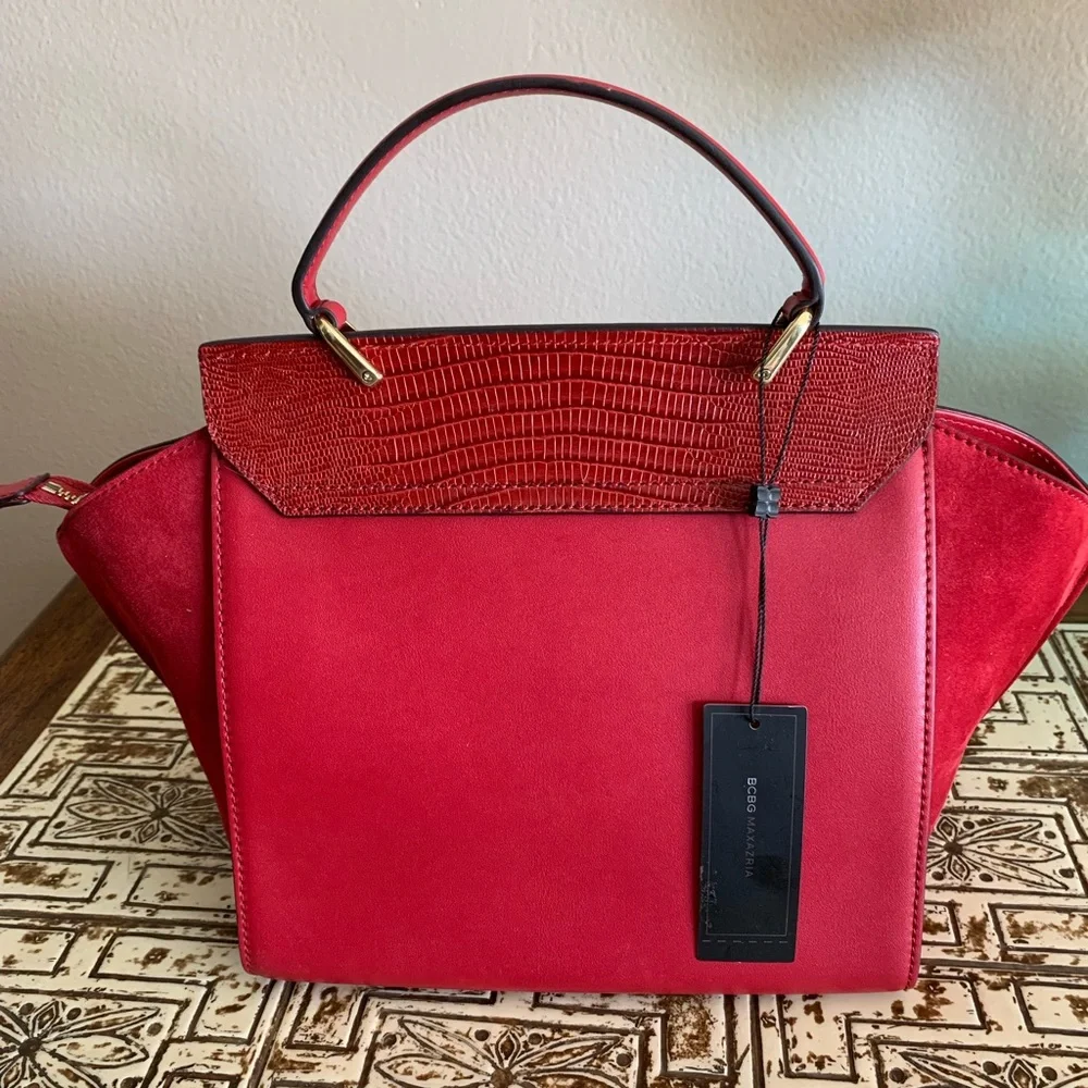 Genuine leather elegant red handbag. Brand new